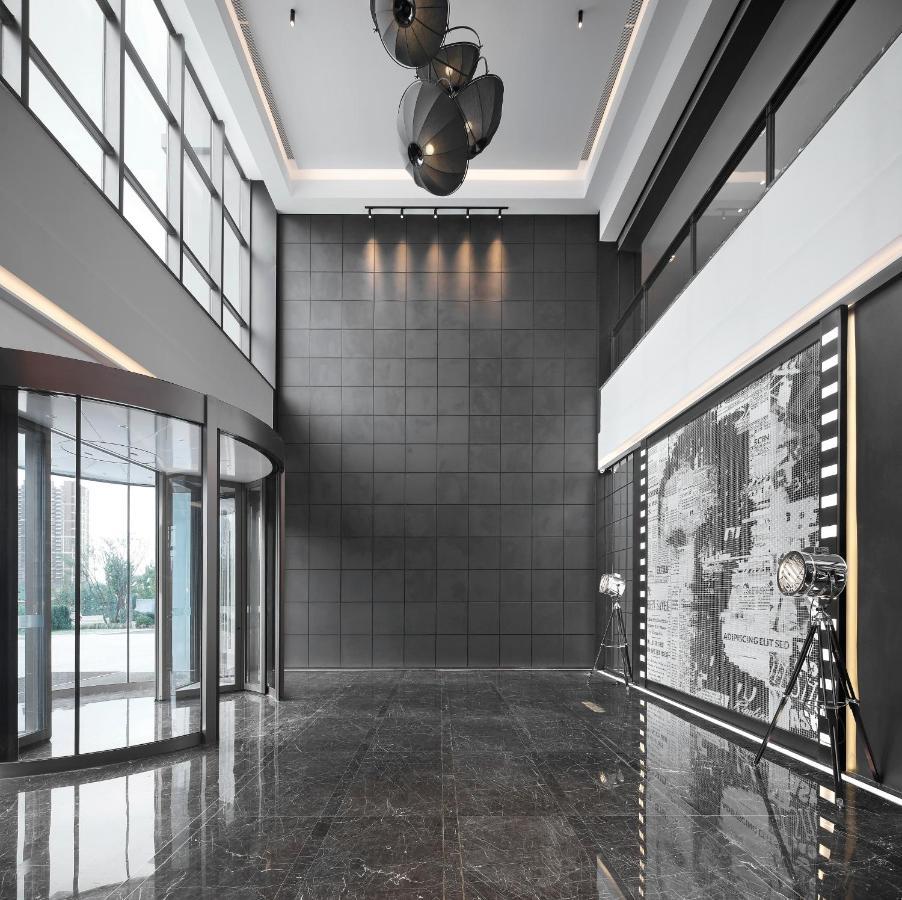 Qingdao Oriental Studio Chuangzhi Ssaw Hotel Bagian luar foto